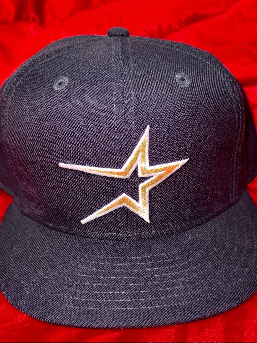 New Era Black Hat with Gold and White Star Emblem